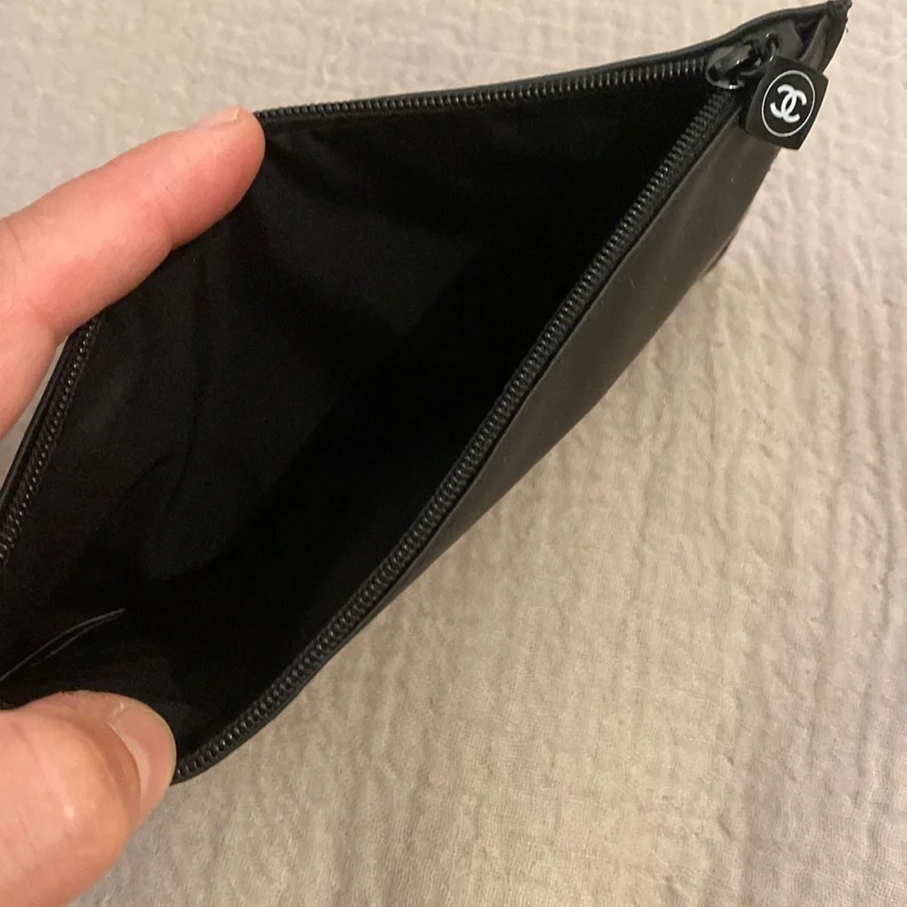 Chanel black cosmetics pouch. New.
